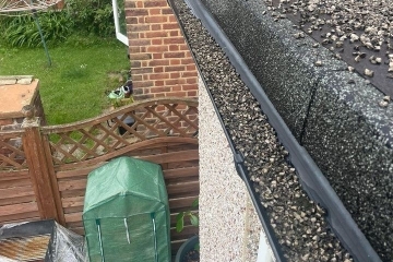 A gutter filled with stones in Croydon